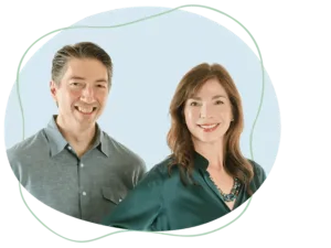 Photograph of Joe and Cheryl Dillon standing together in a bright, welcoming office space, smiling and ready to assist clients. Want to learn more about our personalized divorce mediation approach? Call Equitable Mediation at (877) 732-6682 to schedule your consultation today.