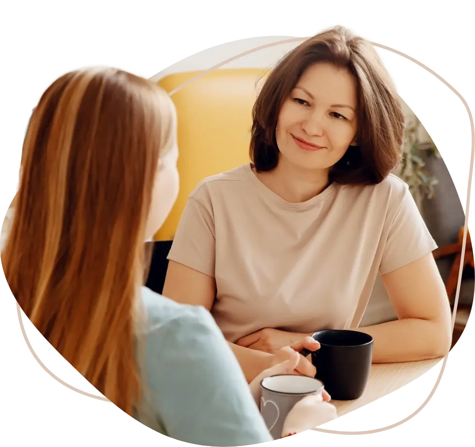 Smiling couple walking hand-in-hand through a sunlit park, representing the Walkers’ journey to an amicable divorce resolution. Ready for your own success story? Call Equitable Mediation at (877) 732-6682 to see how we can help today.